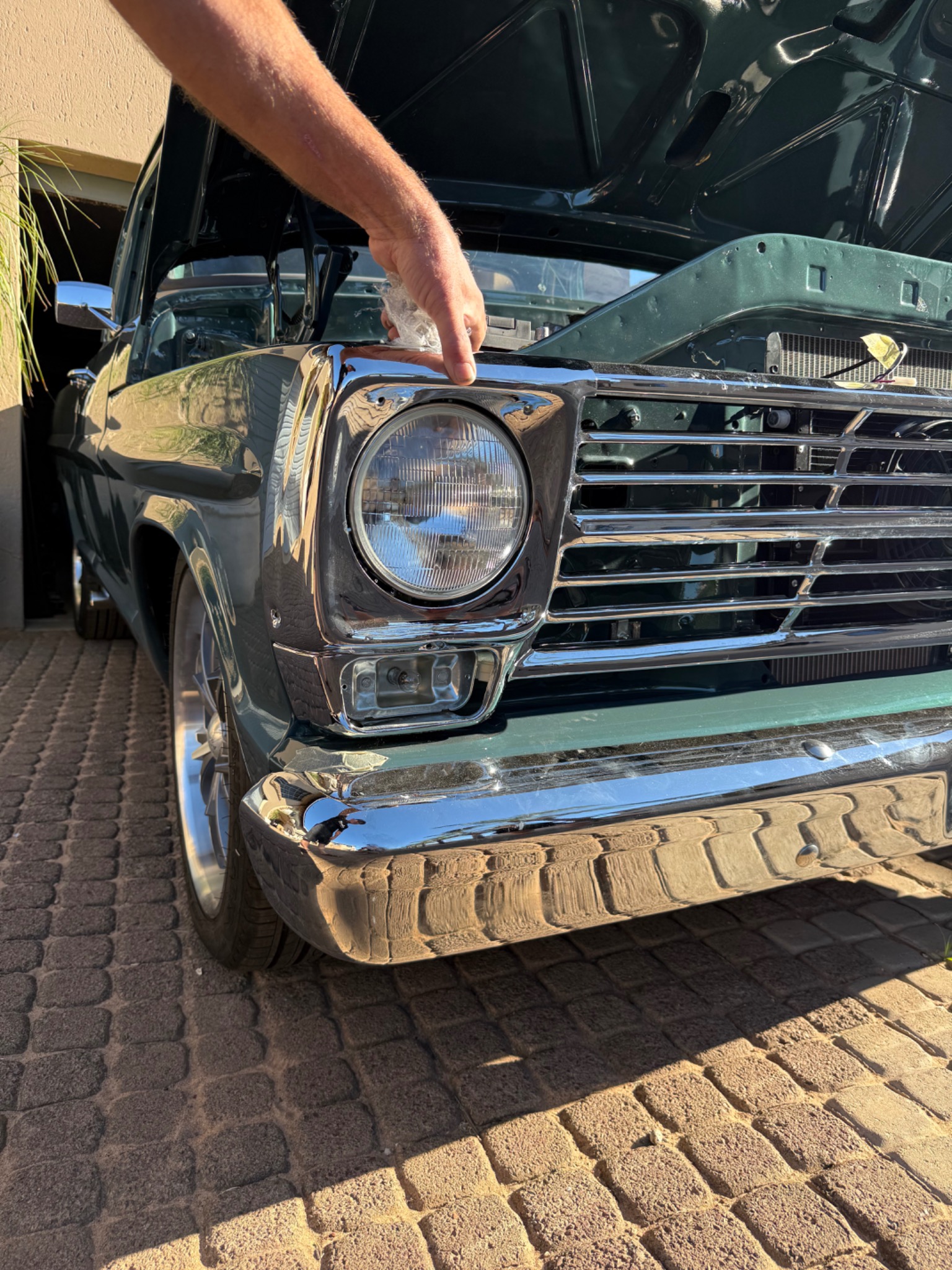 Restored F100 chrome grille and headlight detail
