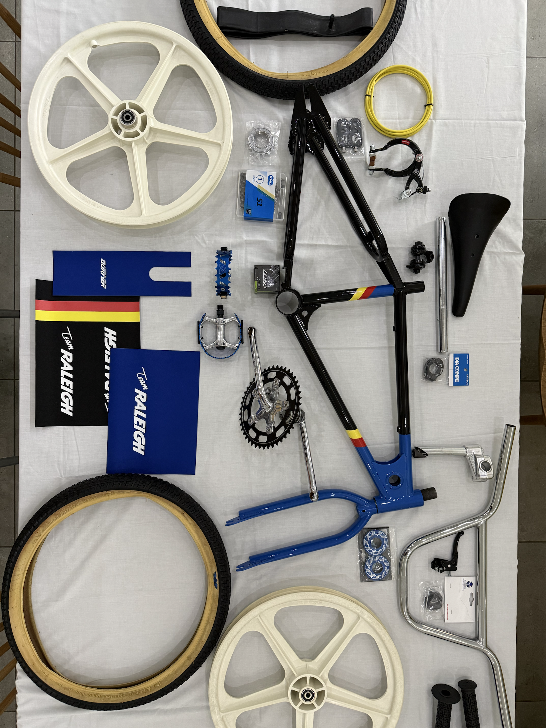 Restored Raleigh Comp III frame and components laid out before final assembly