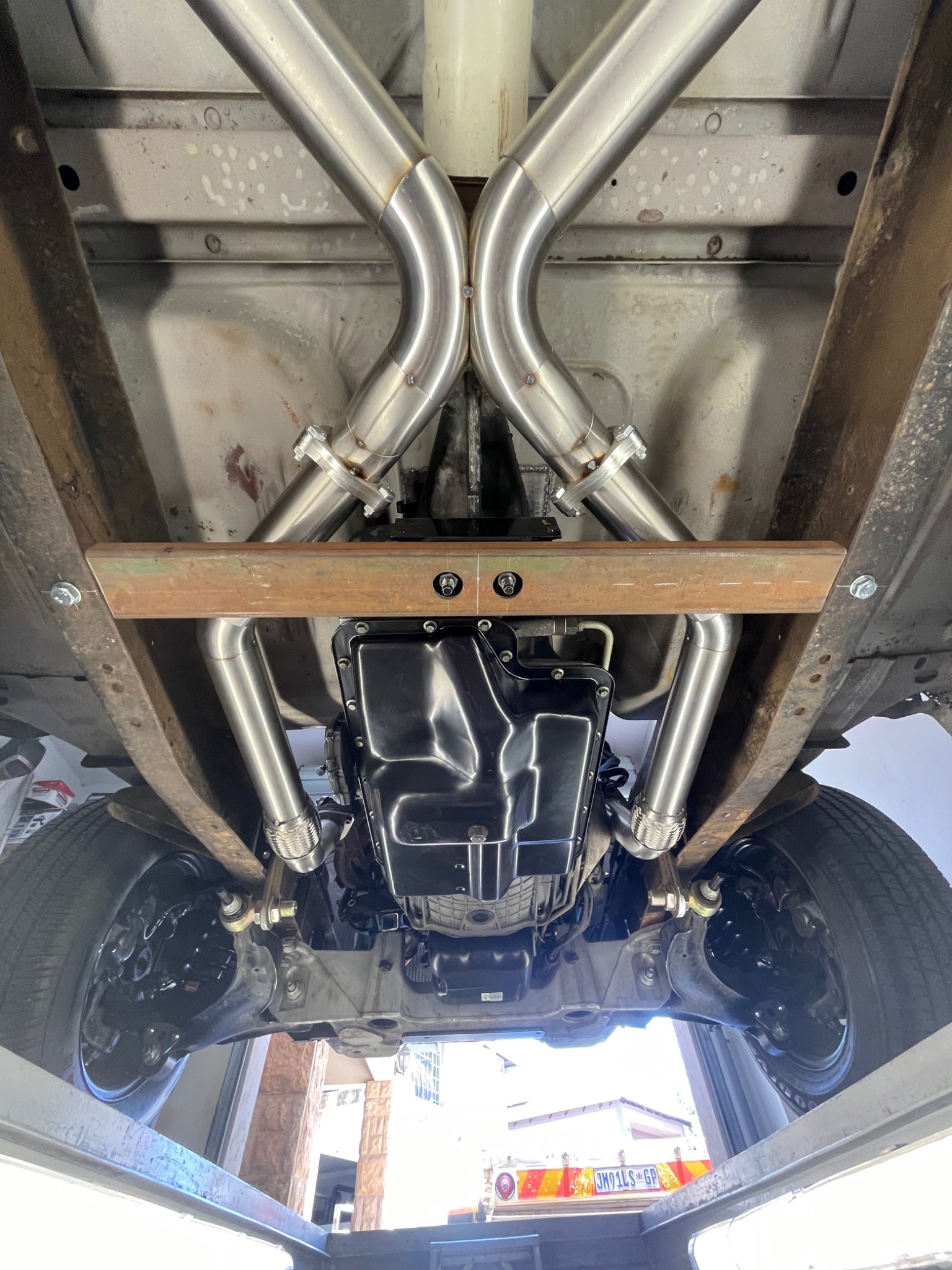 Underside showing transmission and custom exhaust